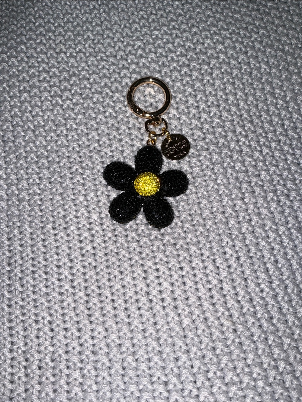 Gold-Tone Rhinestone Black Flower Keychain/Bag Charm with Yellow Center.